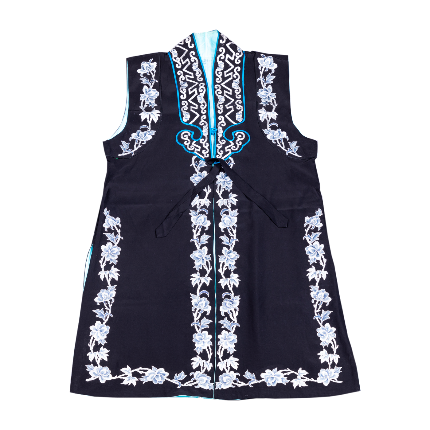   黑绣花圈边大坎肩